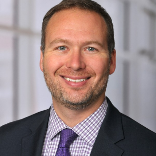 Person in suit and tie